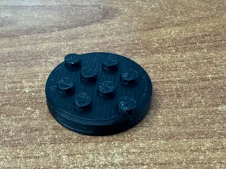 Golf ball marker brick