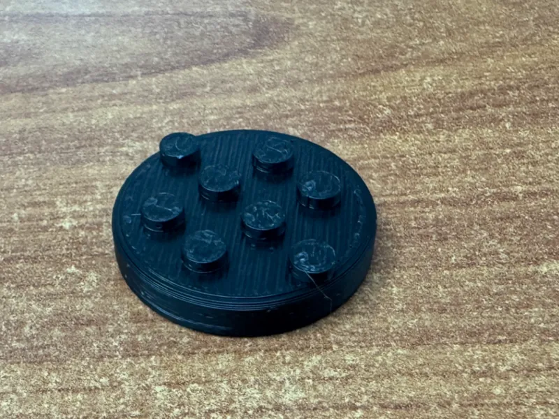 Golf ball marker brick