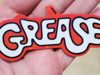 Grease Backpack Tag