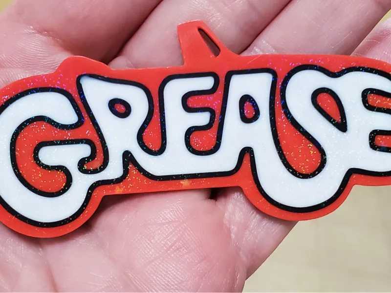 Grease Backpack Tag