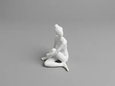Faceless Sculpture Sitting
