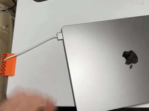 Table side data cable clamp view 4