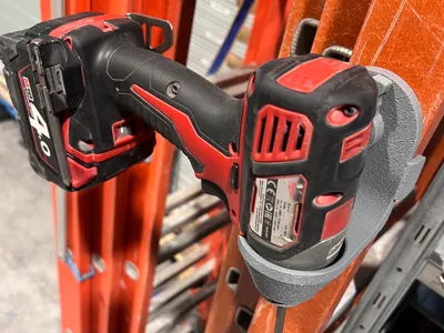 Milwaukee screwdriver on ladder