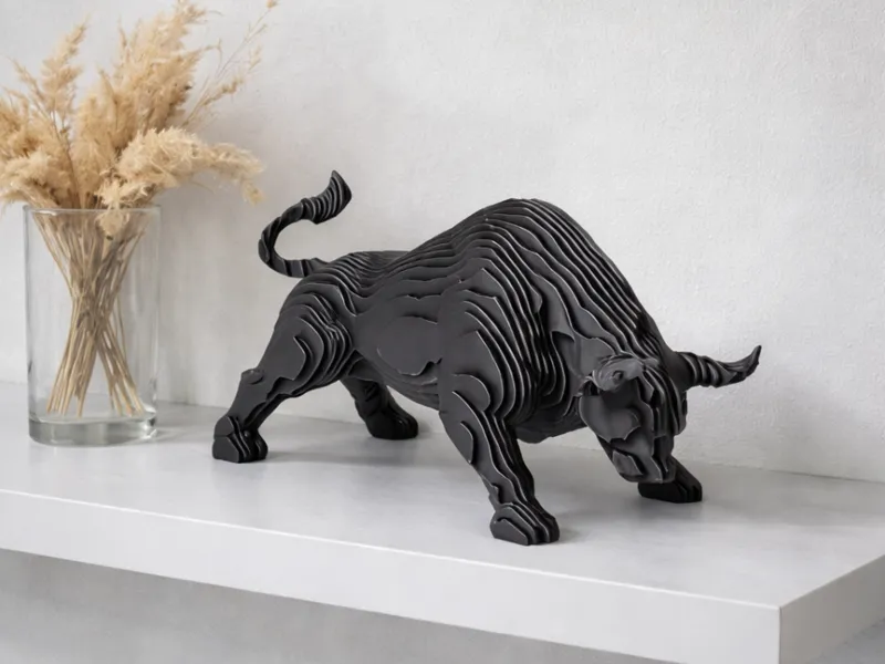 Decorative bull figurine–modern layered sculpture