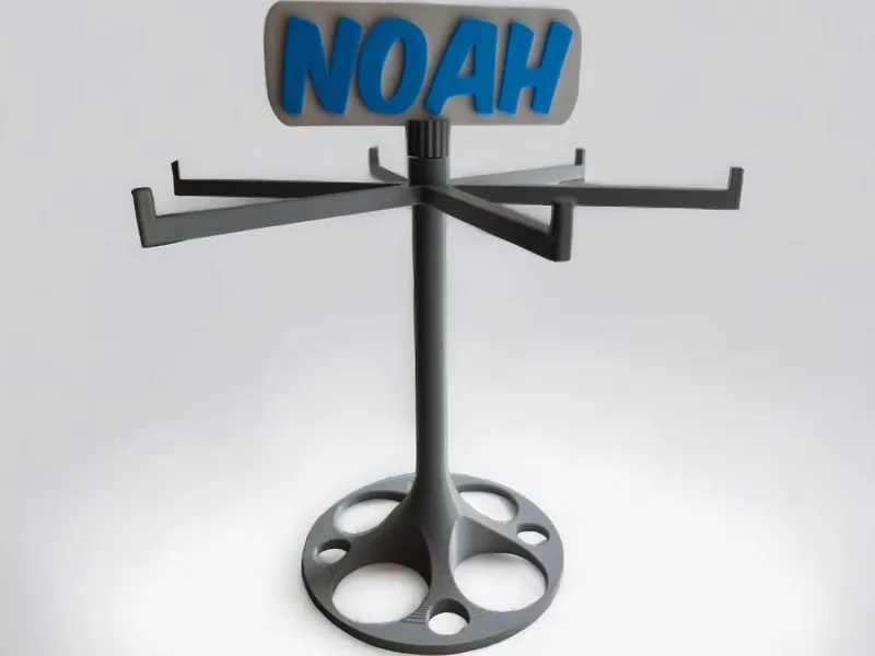 Rotating display with snapfit tag