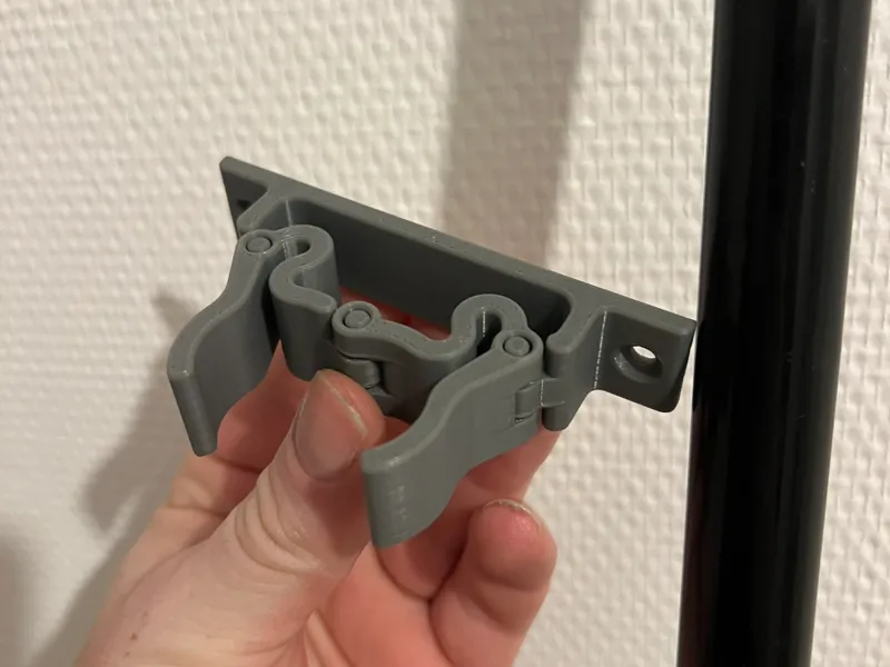 Broom mechanical clip print in place