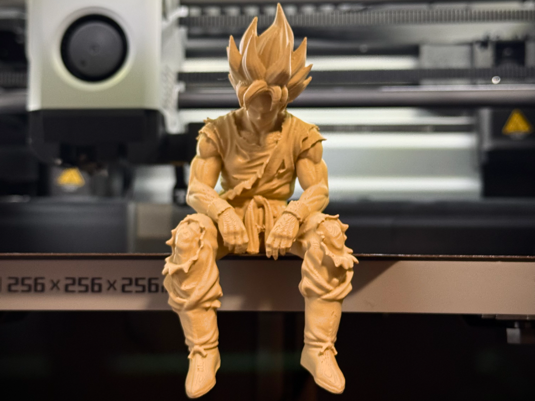 Sad Goku Figurine Sitting on a ledge!