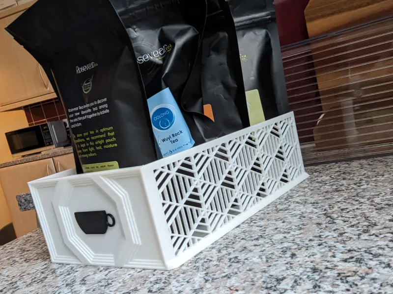 Box for tea pouches, with color-coded cups