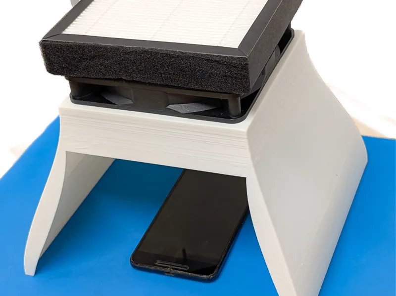 "Laminar Flow" Hood for Phone Screen Protection