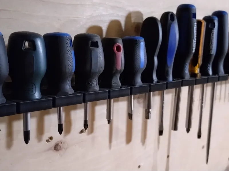 DIN-RAIL screw driver holders