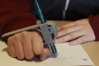 Support stylo pour la paume, aide à l'écriture — photo 10