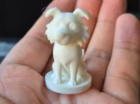 Figurine de chien assis — socle rond — photo 2