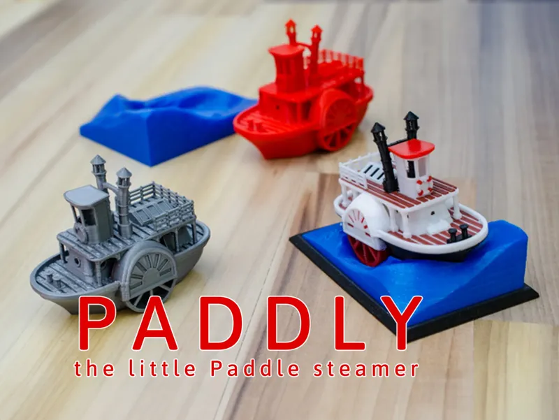 Old paddle-wheel steam boat with display stand
