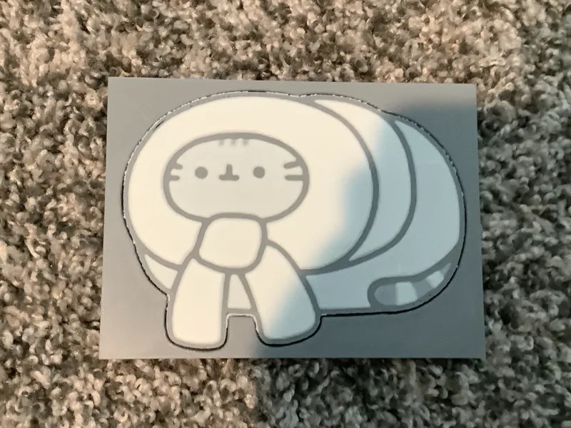 Pusheen wrapped in a scraf