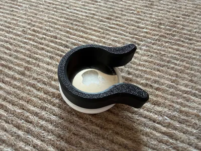 One-piece AirTag Opener