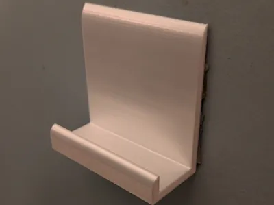 Wall phone holder