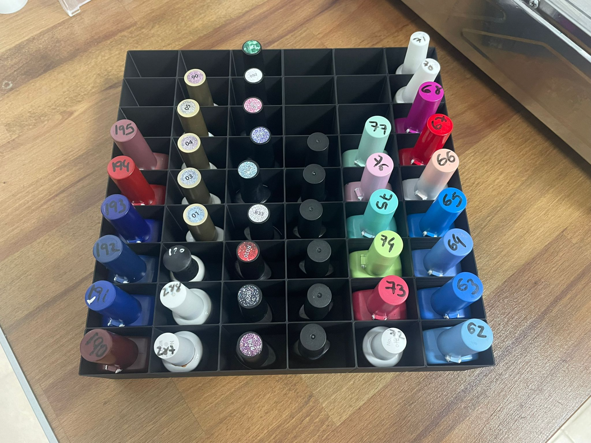 Organizador de pintauñas con 54 huecos