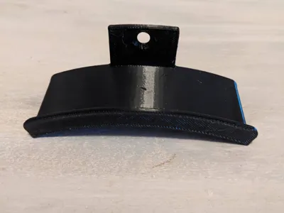 Wall-mounted headphone holder