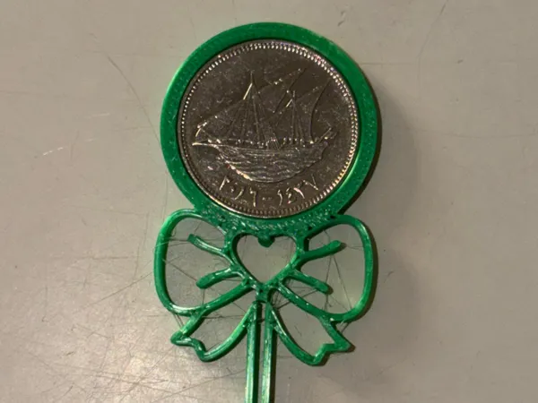 Porte-pièce sucette pour pièces de monnaie