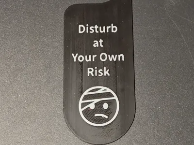 At risk door knob sign