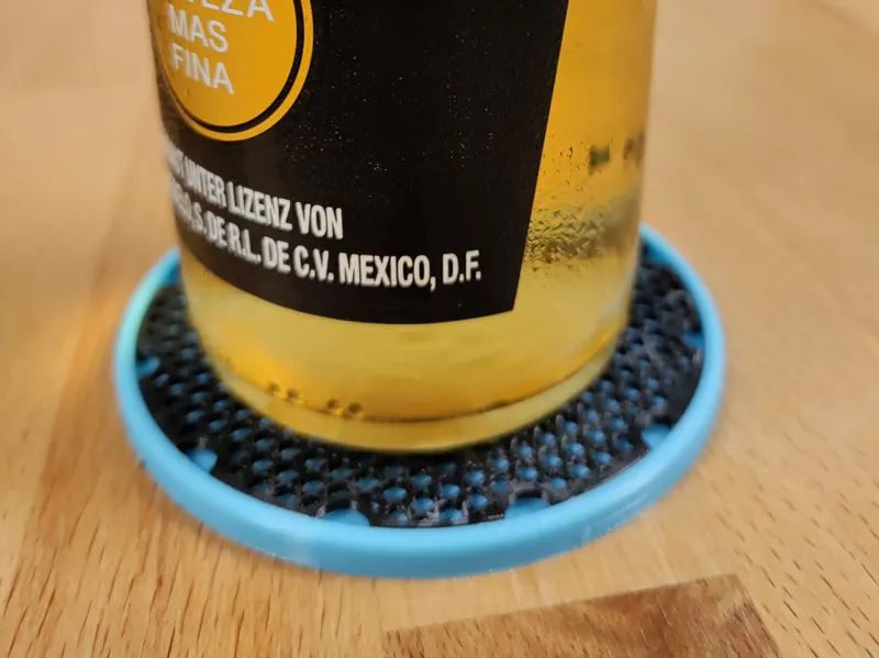 Untersetzer mit Flüssigkeitsauffang