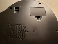 Cache-piles manette Guitar Hero PS3 — photo 2