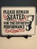PLEASE REMAIN SEATED