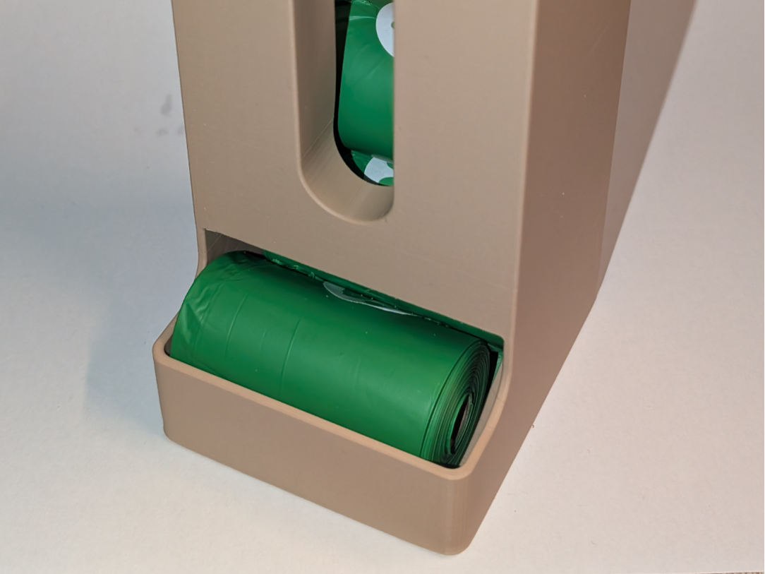 Dog poop bag dispenser (56-62 mm wide bag rolls)