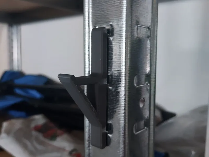 Hook for a metal shelf
