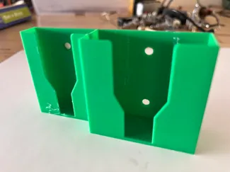Apple TV holder with caddy