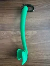 Medium size ball thrower with hole in handle 