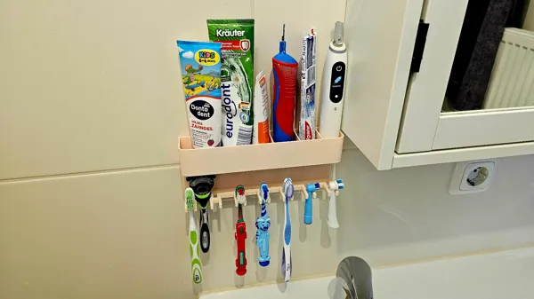 Range-brosses à dents et dentifrice
