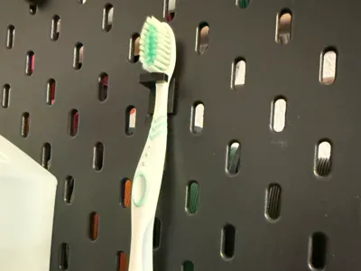 Toothbrush holder for Ikea Skadis