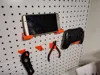Two sizes of hooks, a plier rack, a handle rack, and a set of symmetrical combination racks