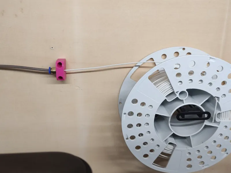 Wall spool stopper
