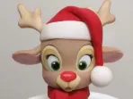 reindeer figurine with Santa hat