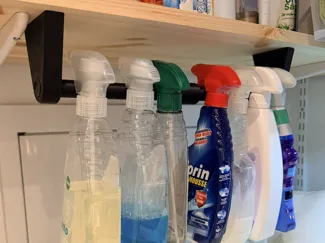 Spray bottle hanger
