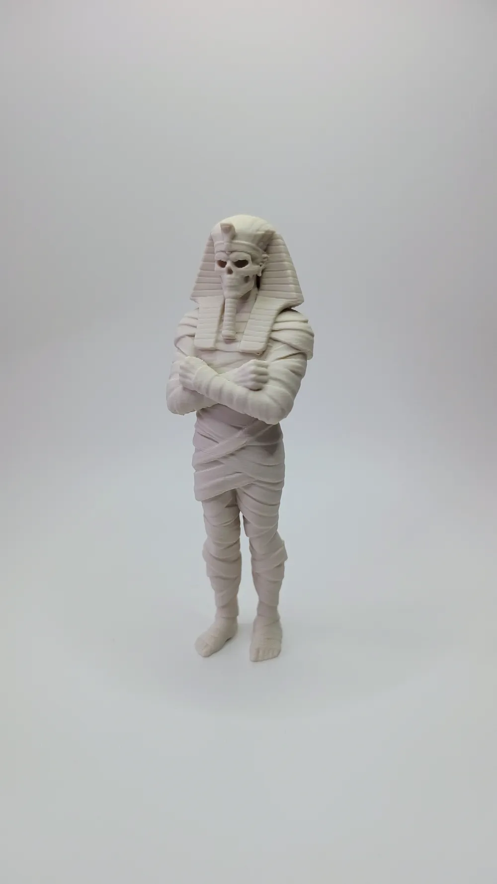 Pharaoh mummy "Tomb Guardian" with skull - Free 3D Print Model - MakerWorld