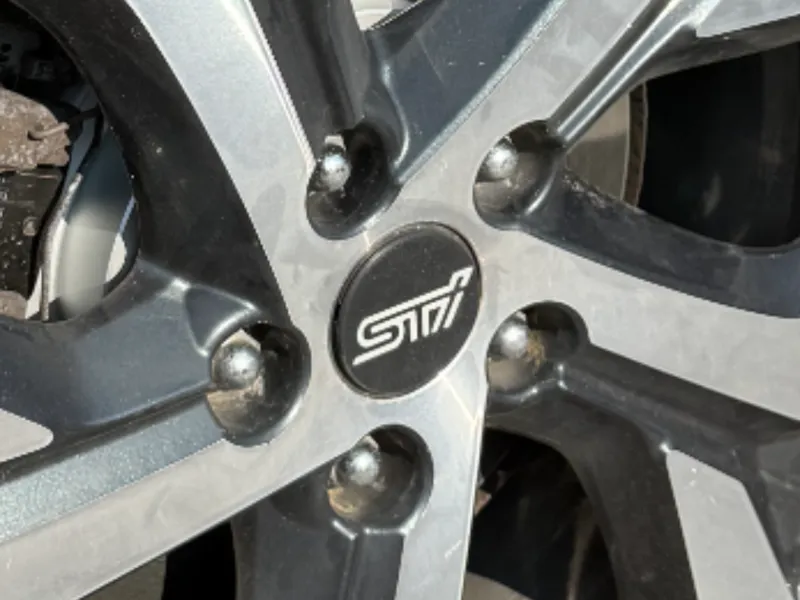Subaru STI logo wheel cap