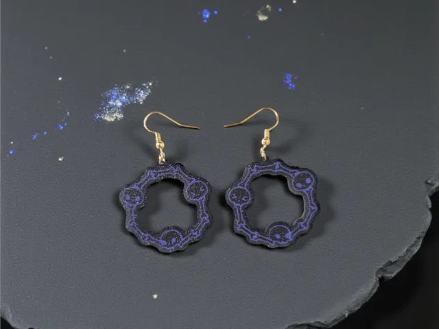 Bones and skulls in a circle earrings