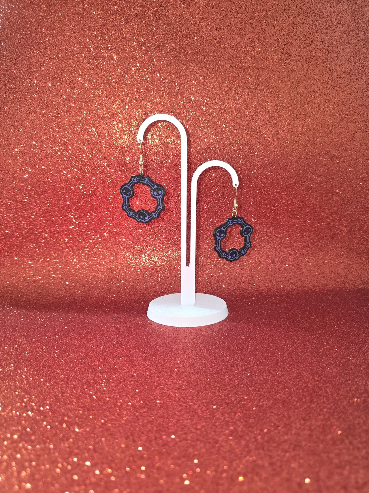 Bones and skulls in a circle earrings view 3