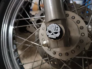 Copri dado anteriore Sportster 883 Harley Davidson