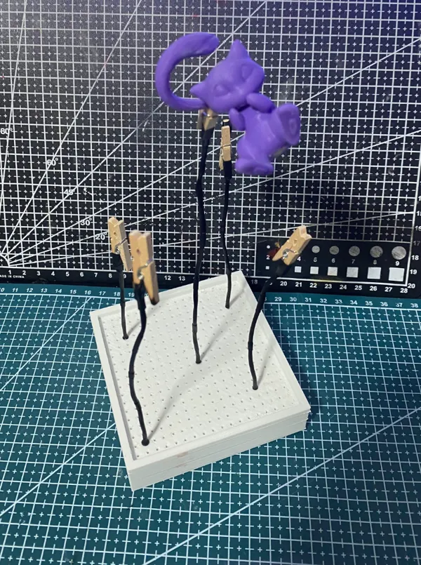 Support pour peindre des figurines à l'aérographe