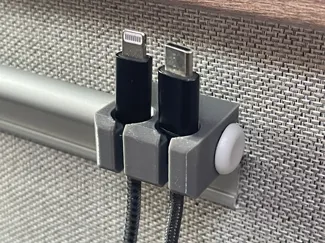 Campervan table rail cable holder