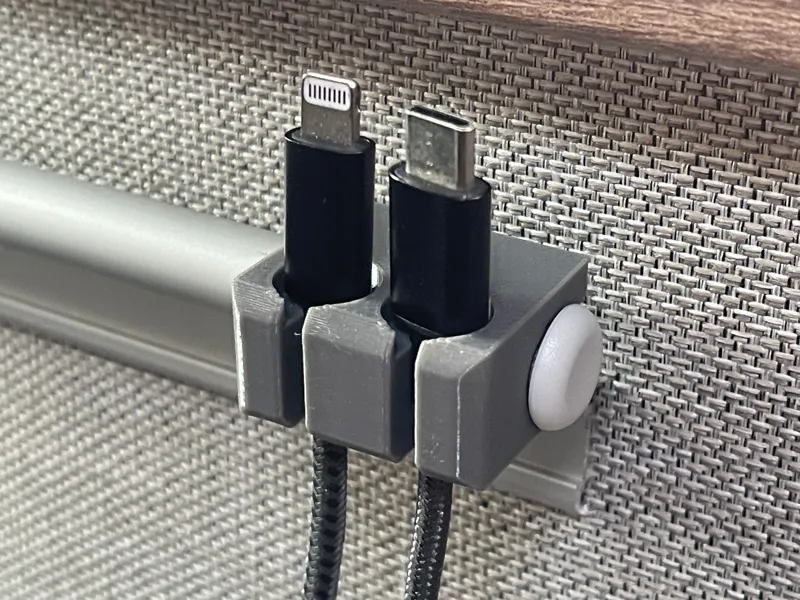 Campervan table rail cable holder