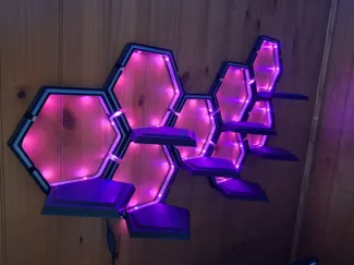 Hex shelves with RGB light routing
