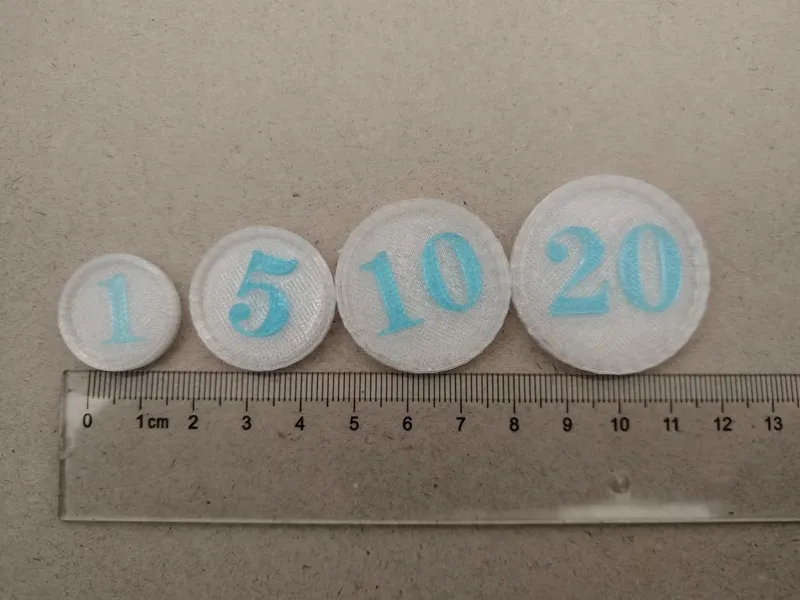 Board game coin tokens