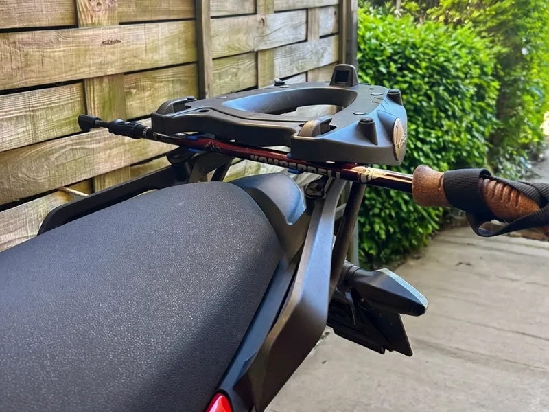 Trekking pole motorcycle clip