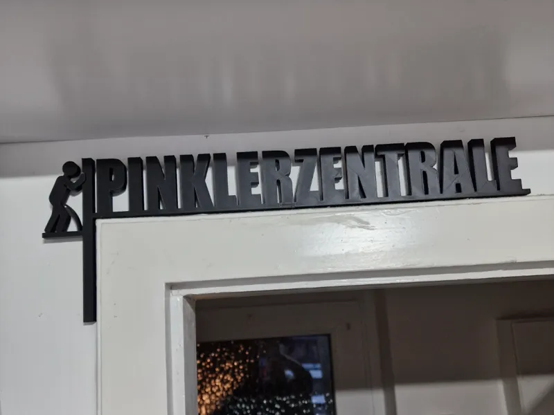 Türrahmenschild "PINKLERZENTRALE" 25cm
