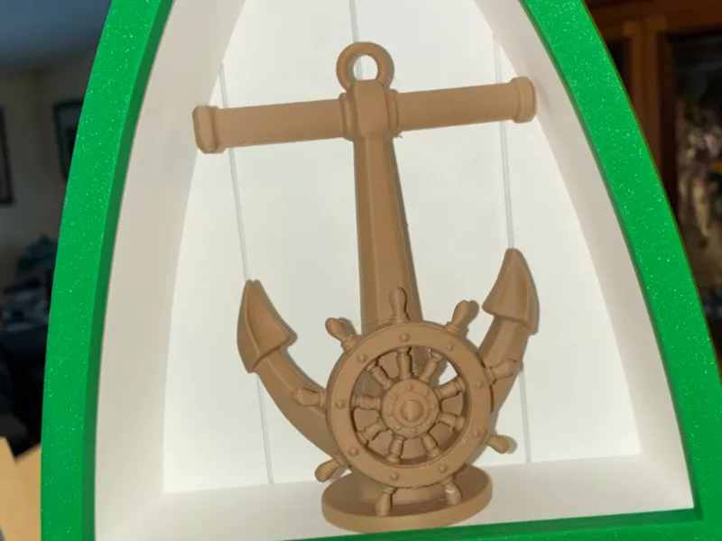 anchor wit a ships wheel